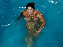 redhead belan enjoys the pool completely uncovered on a hot day