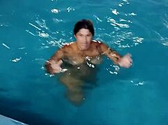 redhead belan enjoys the pool completely uncovered on a hot day
