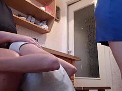 girlfriend licks pussy under table while housekeeper washes dishes