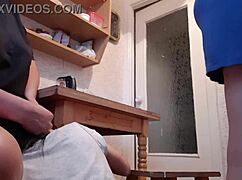 girlfriend licks pussy under table while housekeeper washes dishes