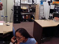 girl with glasses nailed at the pawnshop
