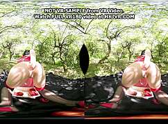 Hotkinkyjo in old apple orchard picks red apples during virtual reality session