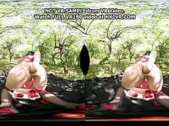 Hotkinkyjo in old apple orchard picks red apples during virtual reality session